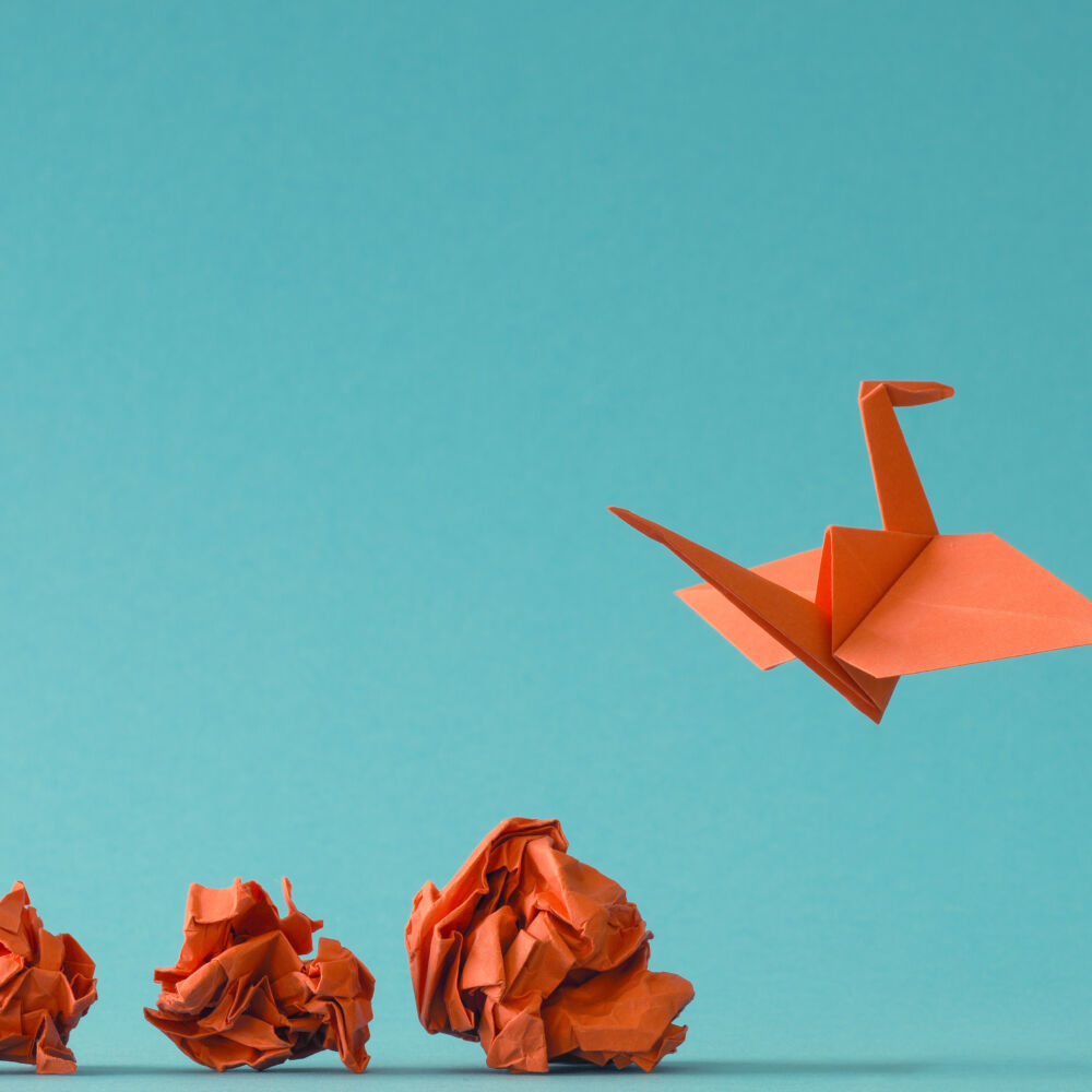 New,Ideas,Or,Transformation,Concept,With,Crumpled,Paper,Balls,And